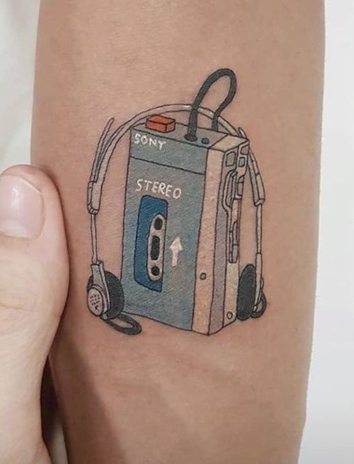 a person with a tattoo on their arm that has an image of a stethoscope in it