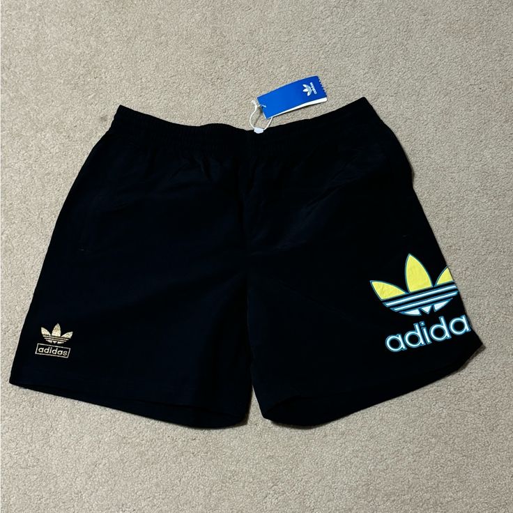 Adidas Nylon Shorts Black Colored Men’s Size Large Brand New Adidas Nylon Bottoms For Streetwear, Adidas Sports Nylon Shorts, Adidas Nylon Sports Shorts, Adidas Sporty Nylon Shorts, Adidas Streetwear Shorts For Summer, Adidas Summer Streetwear Athletic Shorts, Adidas Summer Streetwear Shorts, Sporty Black Swim Trunks For Outdoor, Casual Black Swim Trunks For Outdoor