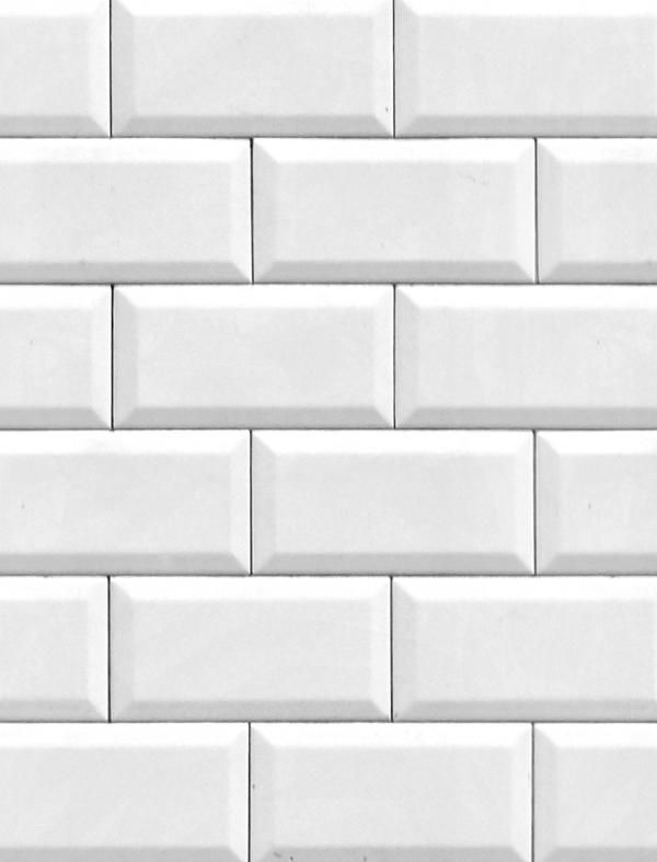 a white brick wall that is very close up