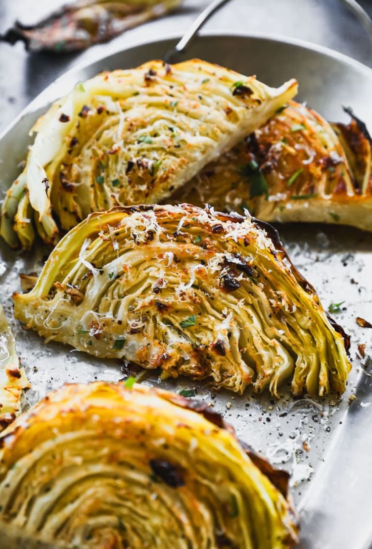 an artichoke is cut in half on a plate