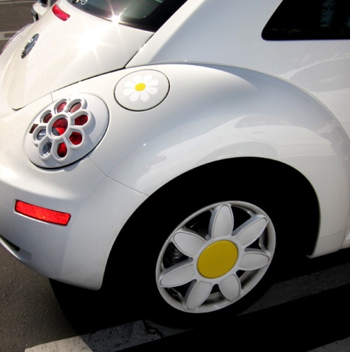 a white car parked in a parking space