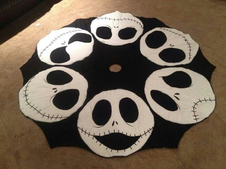 a black and white rug with six faces on it