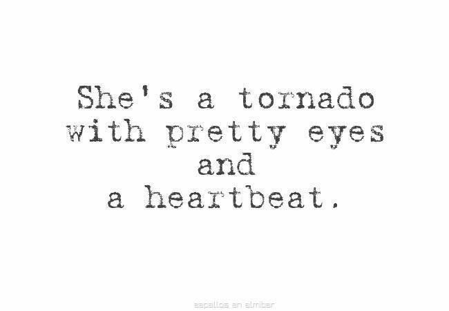 a black and white photo with the words she's a tornado with pretty eyes and a heartbeat