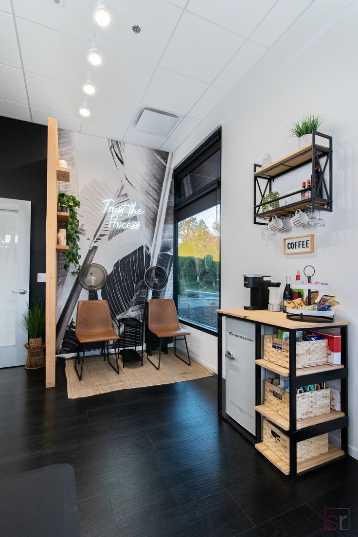 This hair salon studio in Murrieta, California has a white theme with modern wood fixtures and plant accents to create a clean, modern feel. Hair Salon In Living Room, Processing Room Salon, Black And White Hair Salon Ideas, Aesthetic Hair Salon Ideas, Salon Set Up Ideas Layout, 1000 Sq Ft Salon Layout, Edgy Salon Interior Design, Hair Salon Accent Wall, Hair Salon Paint Colors Ideas