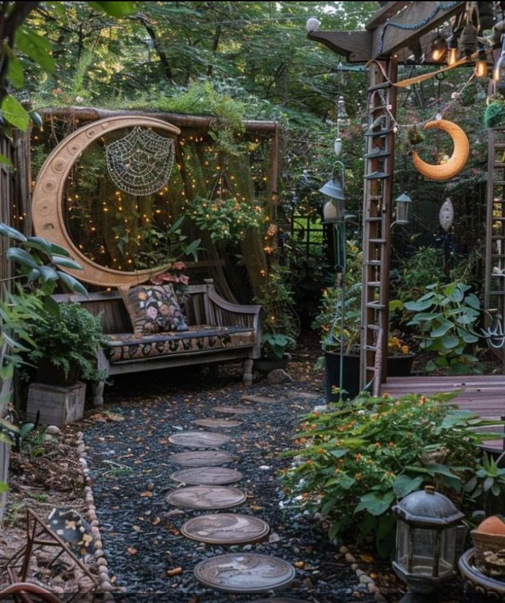 an outdoor garden with lots of plants and lights hanging from the ceiling, along with a bench