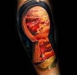 a man's arm with an abstract painting on it and a keyhole in the middle