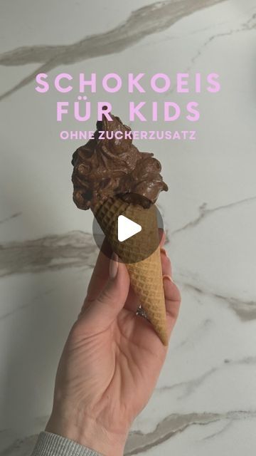 someone is holding an ice cream cone with chocolate in it and the words schookee's fur kids