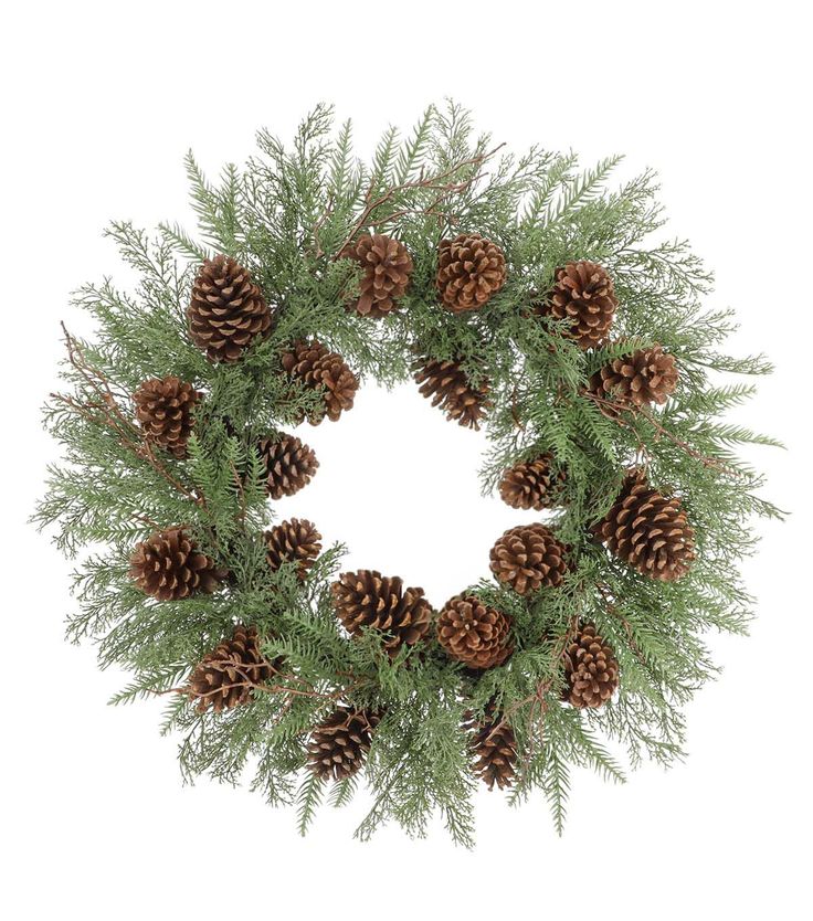 a pine cone wreath with green branches and cones