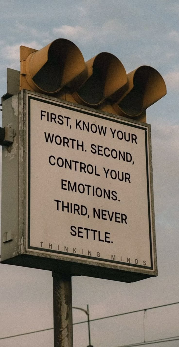 a traffic light with a sign that says first, know your worth second, control your emotions third, never setle