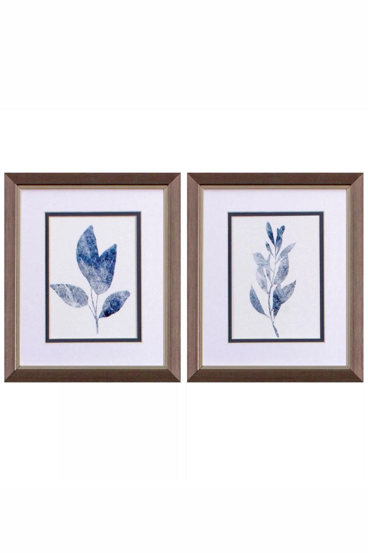 two framed pictures with blue leaves on them