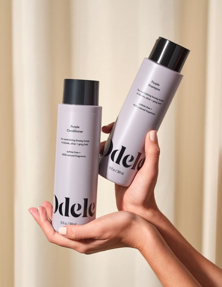 For neutralizing brassy tones in blonde, silver + gray hair Bye, brassiness. Hello, shine. This salon-grade purple shampoo is formulated with amaranth and plant-based proteins that hydrate and help promote overall hair health. Violet pigments enhance and restore blonde, silver + gray tones, keeping your color exactly as nature (or your colorist) intended. Balanced at a pH of 5.0-5.5, our Purple Shampoo is best for all hair types + textures, especially those in need of protecting their intended h Hair Color Product Photography, Cosmetic Photoshoot Ideas, Product Styling Photography, Silver Gray Hair, Lightened Hair, Blonde Silver, Purple Conditioner, Shampoo Brands, Salon Shampoo