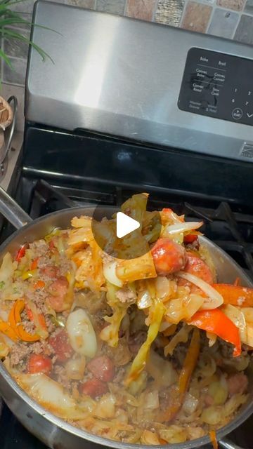 a pan filled with food sitting on top of a stove