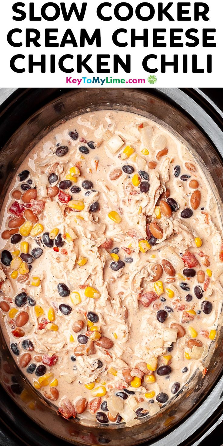 slow cooker cream cheese chicken chili recipe in the crock pot with text overlay