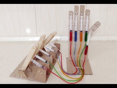 an assortment of different colored pencils and markers in a wooden holder on the floor