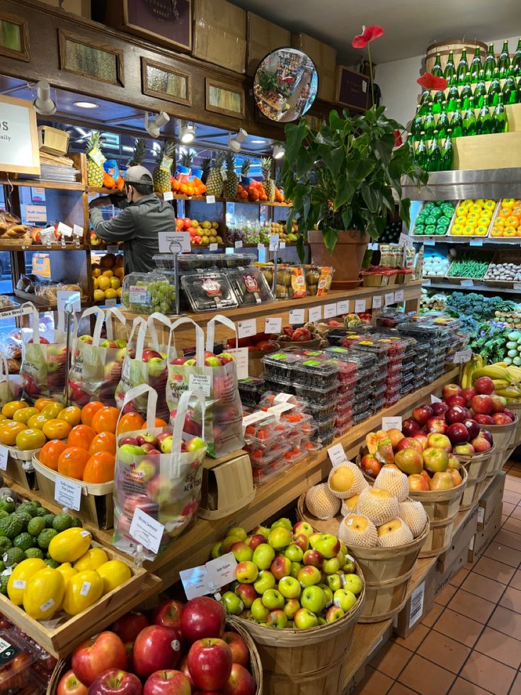 a store filled with lots of fresh fruits and vegetables