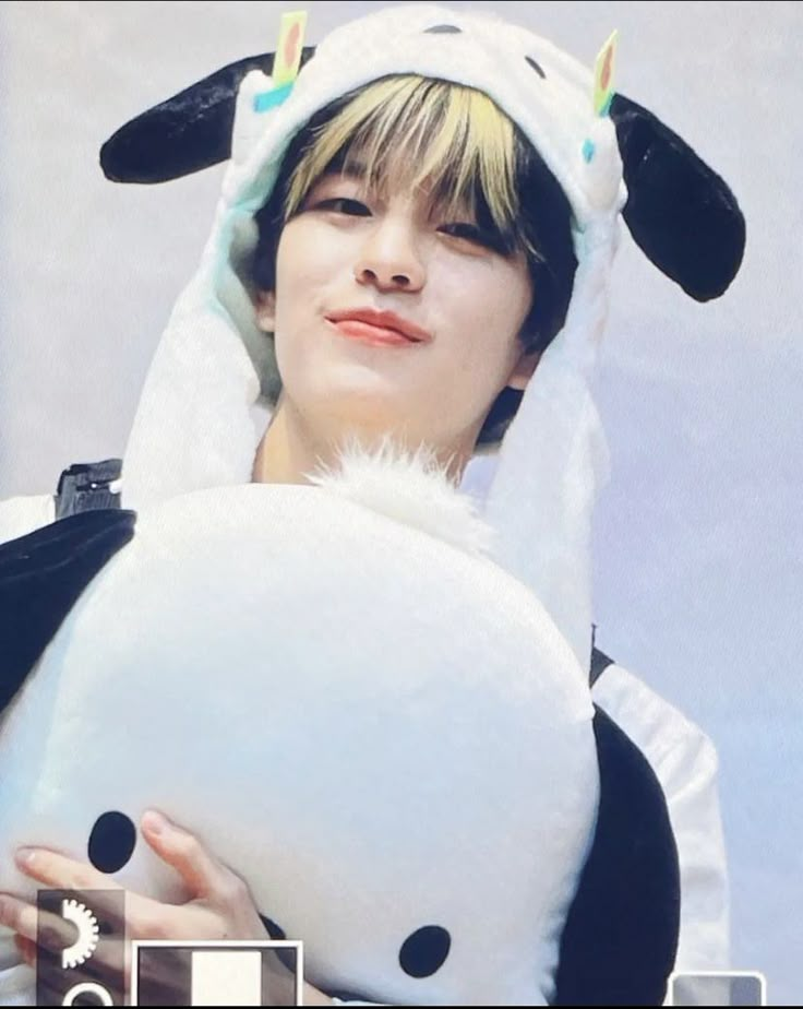 a person holding a stuffed animal in front of their face and the caption says, i love you