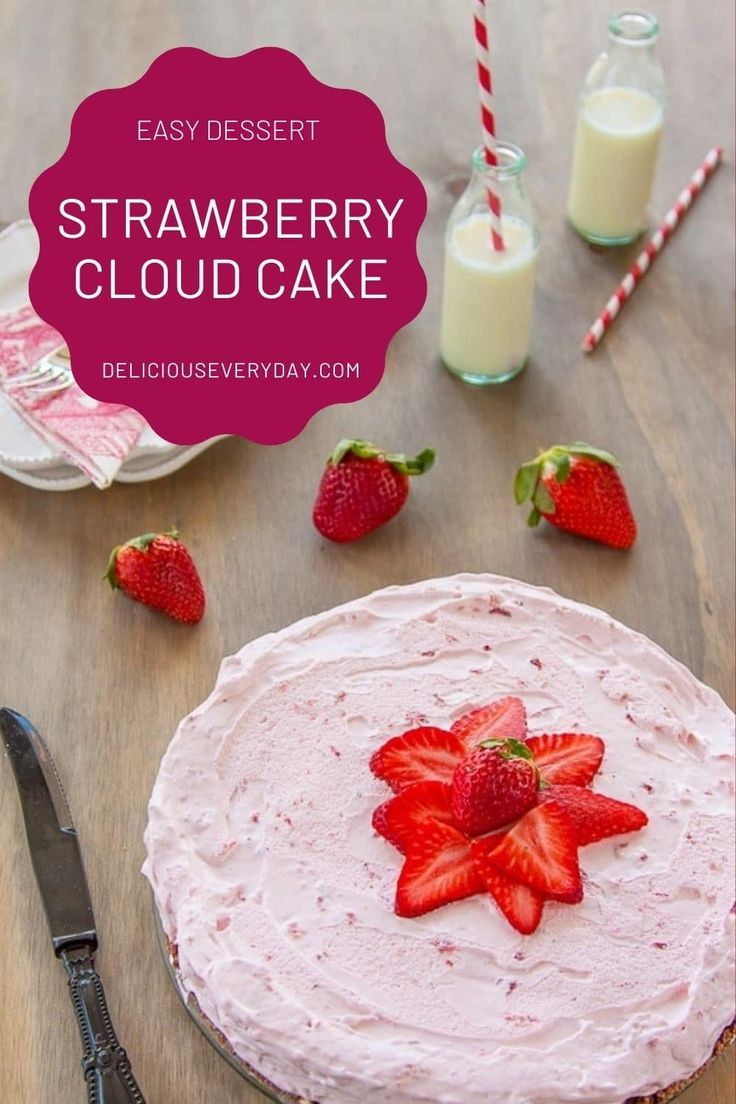 strawberry cake with whipped cream and strawberries next to it on a wooden table, surrounded by milk and strawberries