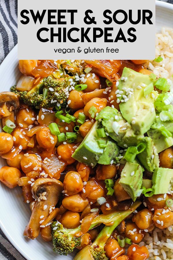 a white plate topped with broccoli and chickpeas