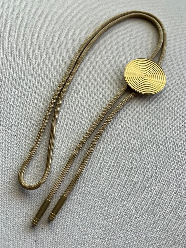 Navy Suit Bolo Tie, Luxury Artisan Sterling Silver Bolo Tie, Gold Bolo Tie, Modern Bolo Tie, Adjustable Brass Necklace With Cord, Brass Necklace With Adjustable Cord, Adjustable Metal Lariat Necklace For Formal Occasions, Adjustable Brass Jewelry With Cord, Adjustable Lariat Bolo Tie