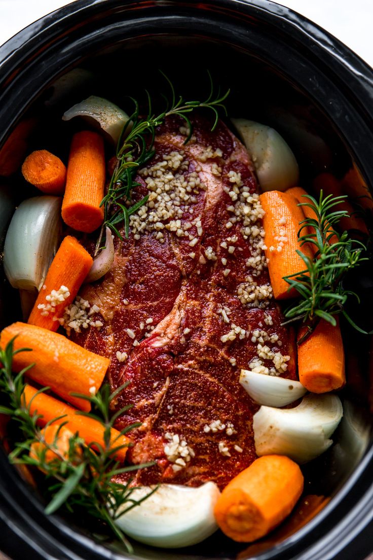 the meat and vegetables are being cooked in the slow cooker to make it easier for them to cook