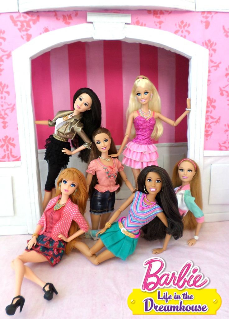 barbie dolls are posed in front of a doll house with pink walls and striped wallpaper