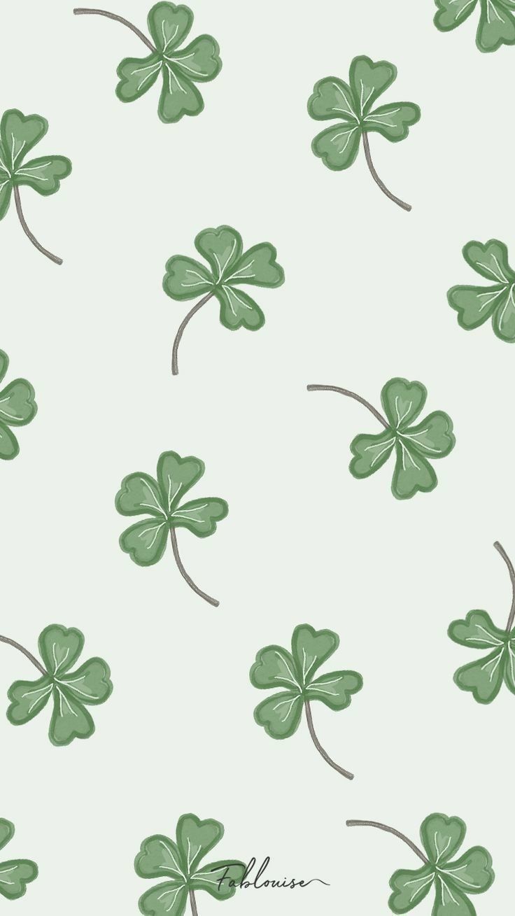 four leaf clovers are arranged on a light green background with the word st patrick's day written below them