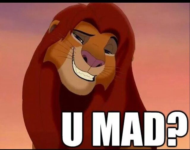 the lion king is smiling with his head turned to look like he's saying u mad?