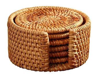 three wicker baskets stacked on top of each other in the shape of a circle