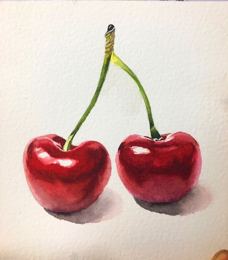 two cherries sitting side by side on top of a piece of watercolor paper