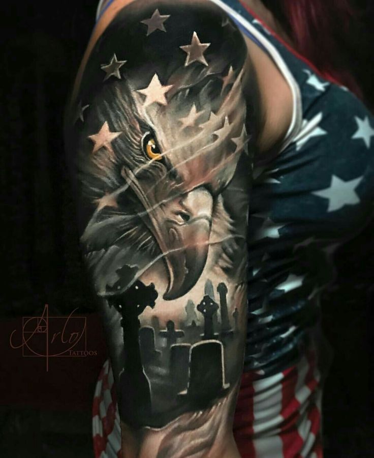 an eagle and cemetery tattoo on the upper half of a woman's left arm