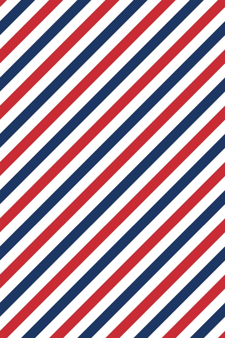 a diagonal striped pattern with red, white and blue stripes on the bottom half of it