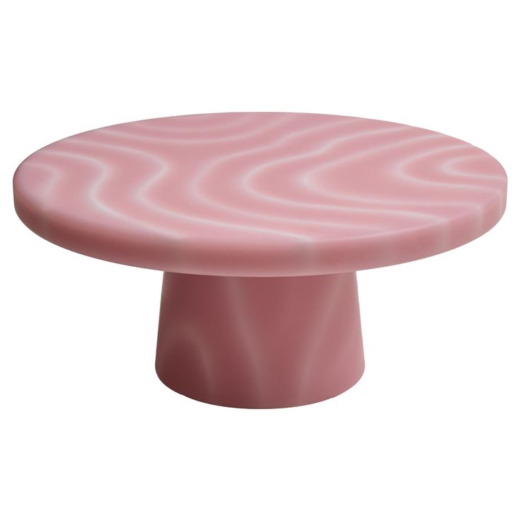 a pink table with wavy design on it