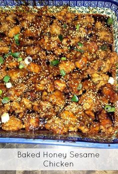 baked honey sesame chicken in a blue dish