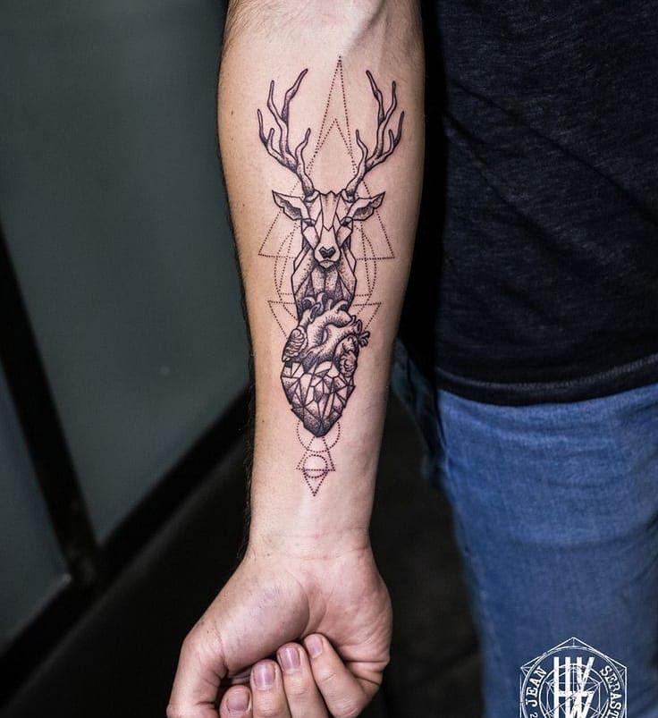 a man with a deer tattoo on his arm