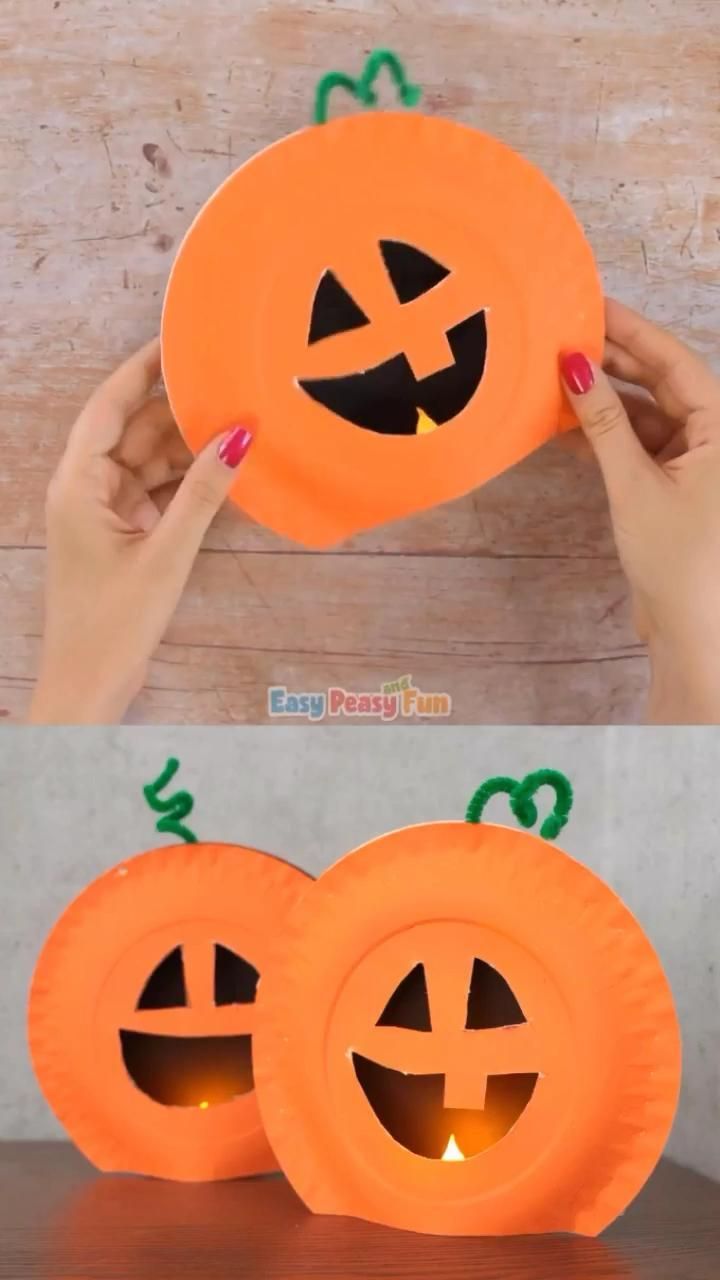 two paper plates with pumpkin faces on them