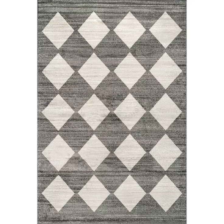 a gray and white rug with diamonds on it