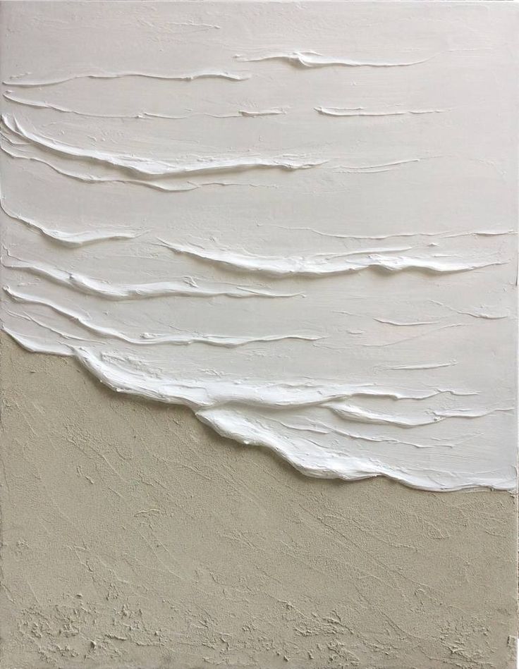 an abstract painting with white paint and waves on the wall, in neutral tones that appear to have been painted over