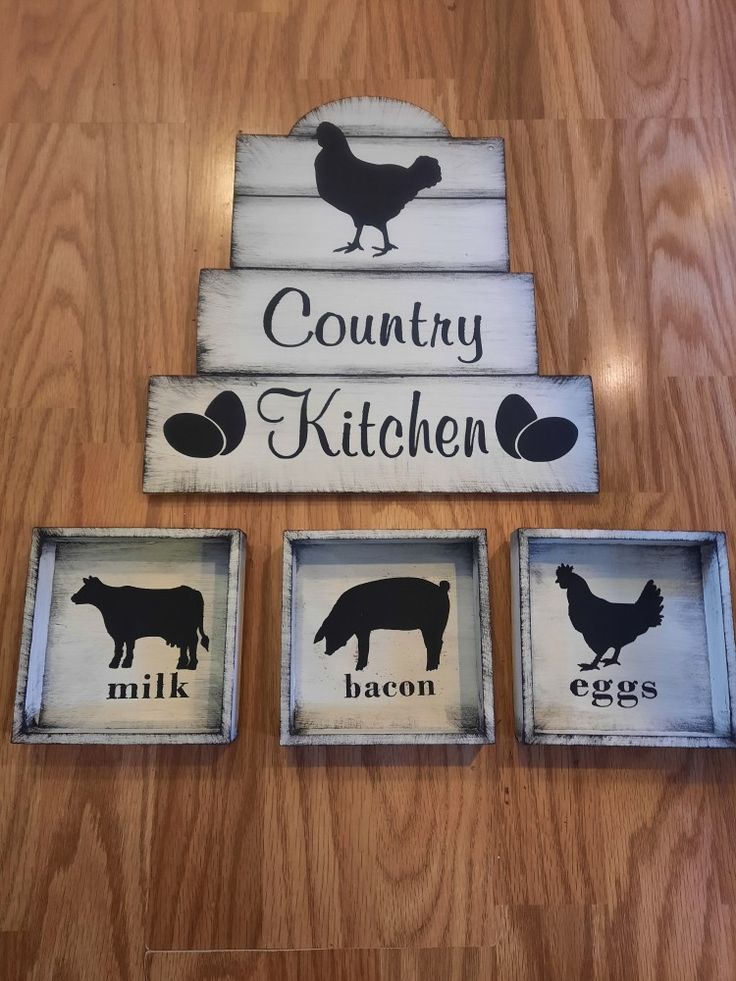 three coasters with the words country kitchen and farm animals on them, sitting on a wooden floor