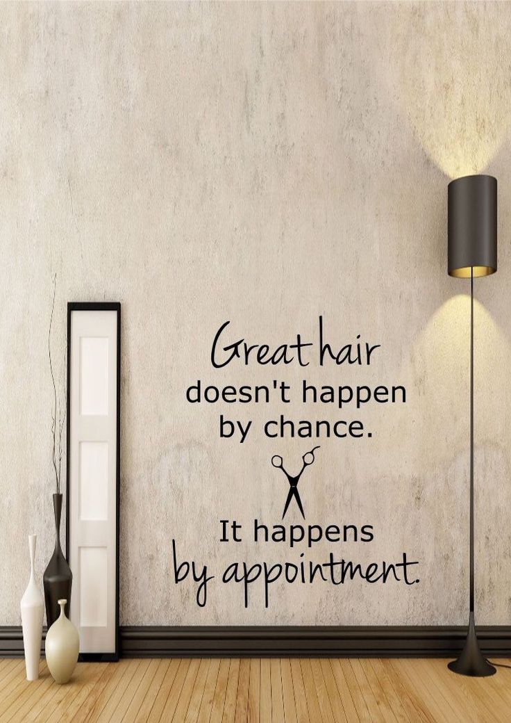 a wall with a quote on it that says great hair doesn't happen by chance