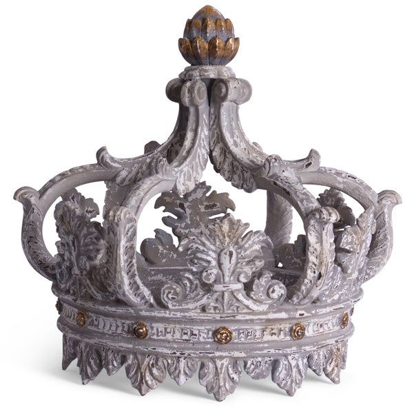 an ornate silver crown on a white background