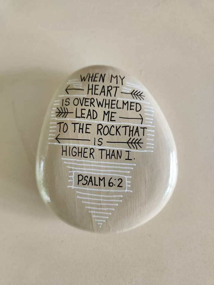 a rock that has some writing on it