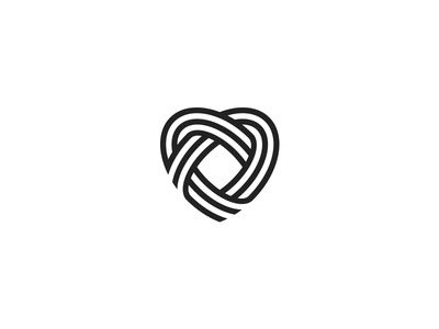 the logo for an artisan company, called knoted heart on a white background