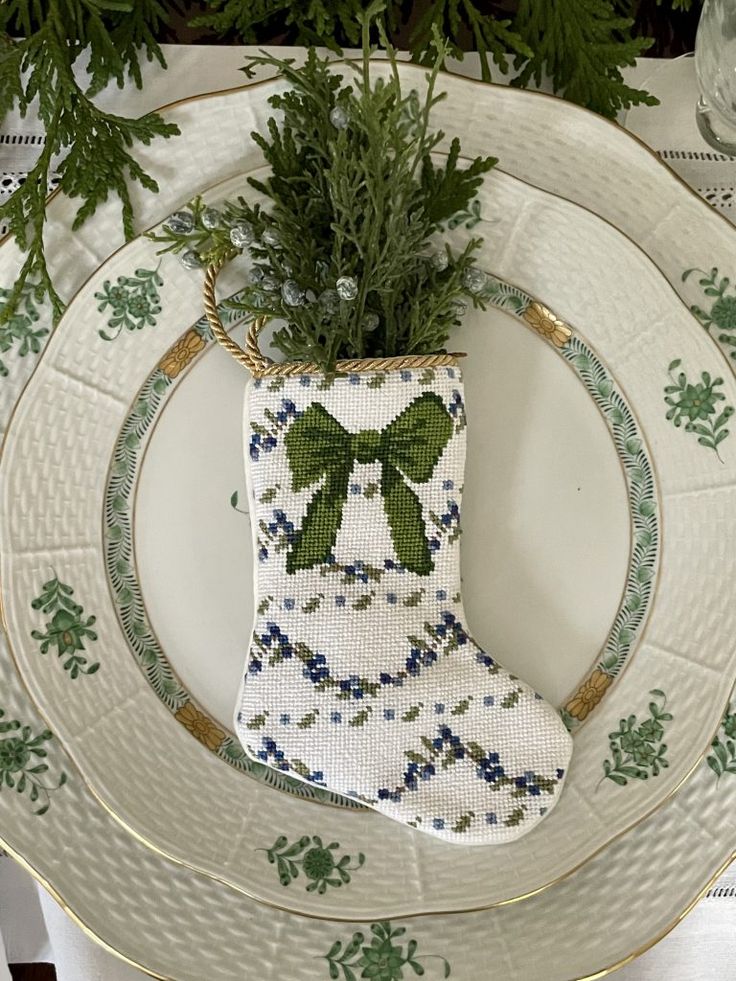 a white plate topped with a christmas stocking