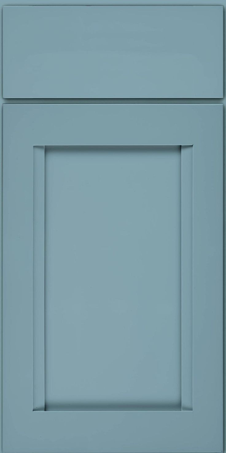 an image of a blue cabinet door that is painted in the same color as it appears