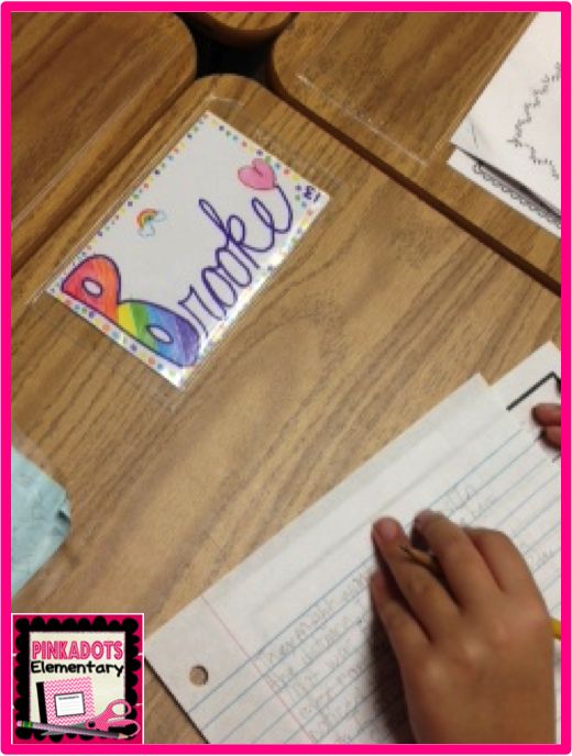 a person writing on top of a piece of paper