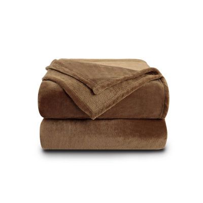 two brown blankets folded on top of each other