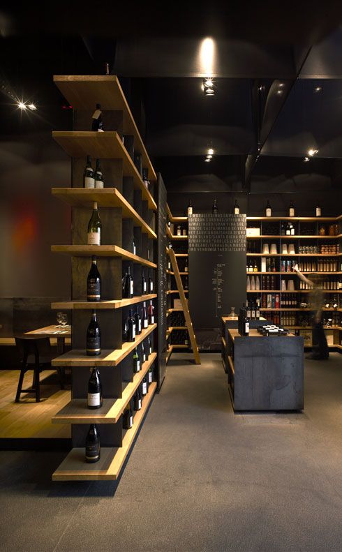 a wine store with shelves full of bottles