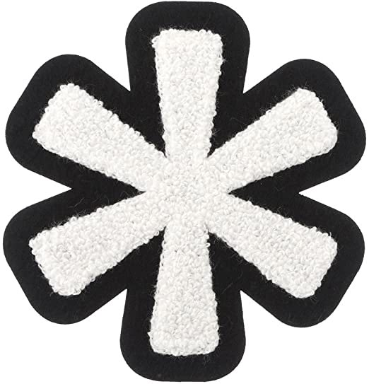 a black and white flower shaped patch