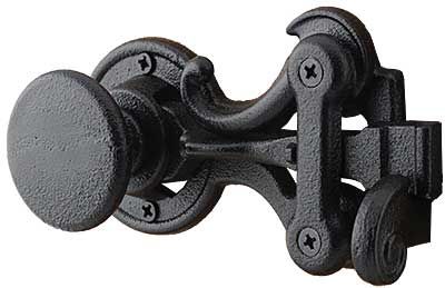 an image of a door handle with knobs on the front and back sides in black