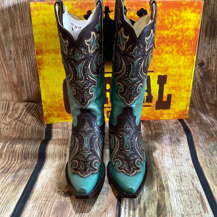 Corral Distressed Turquoise Boot - G1184 A Dash Of Color And An Intricately Embroidered Motif Lends A Feminine Appeal To Your Ensemble When You Don These Supple Leather Boots In Distressed Turquoise. 2'' Heel 12'' Shaft 14'' Circumference Pull-On Snip Toe Full Grain Leather Upper Leather Lining Leather Sole Made In Mexico Western Turquoise Boots With Patina, Turquoise Western Boots With Patina, Western Turquoise Boots For Rodeo, Turquoise Western Boots For Ranch, Fitted Turquoise Boots For Ranch, Turquoise Western Boots With Snip Toe, Green Snip Toe Ranch Boots, Green Western Boots For Rodeo, Turquoise Patina Boots With Round Toe